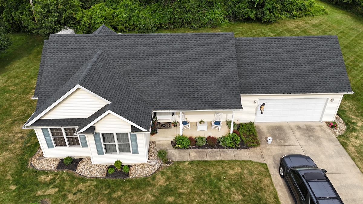 dark asphalt roof white siding