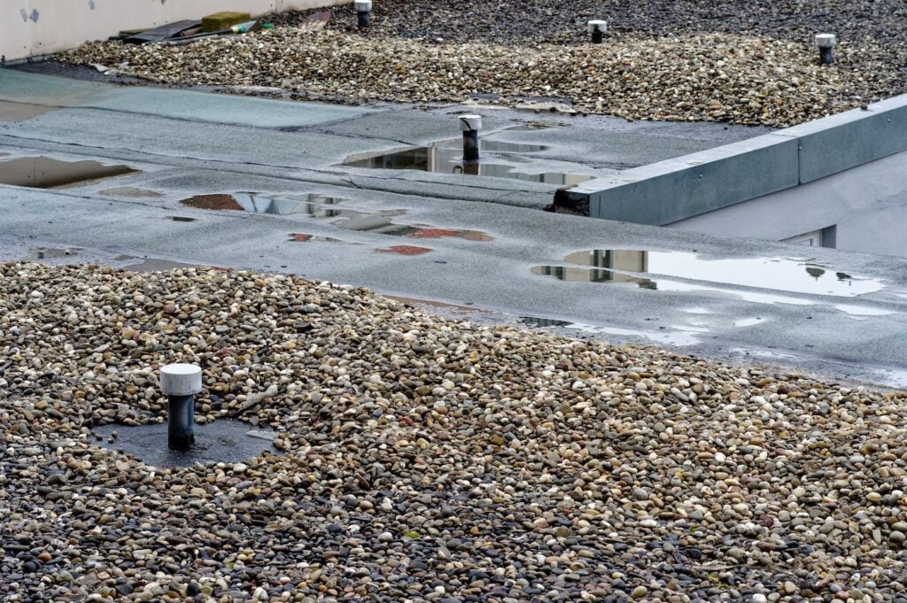 Broken flat roof with macro with broken rubber