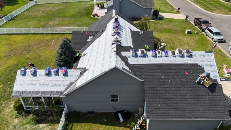 One Way Roofing team working on a roof