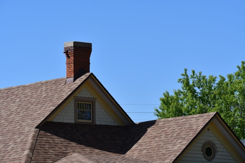 brown asphalt shingles dutch gable roof