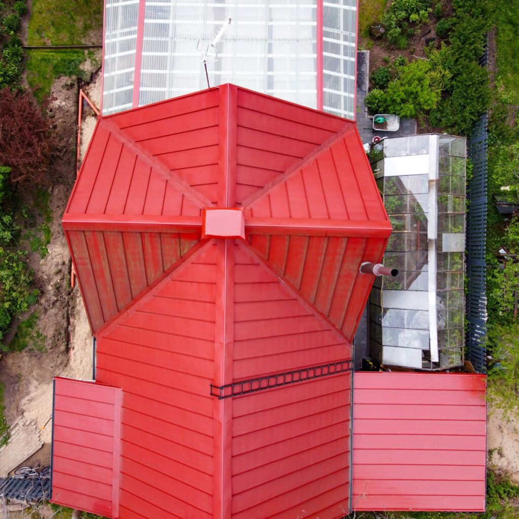 metal standing seam roof aerial view classical red roof