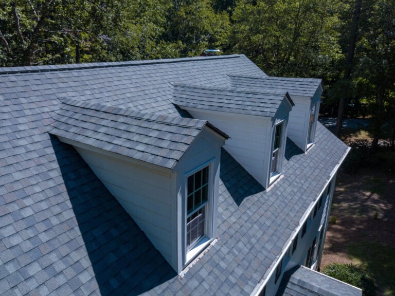 dark blue shingles roof house